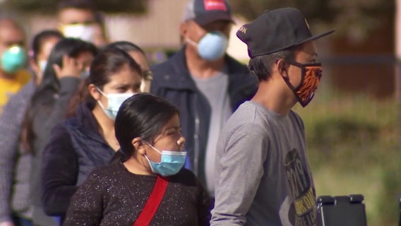 As COVID-19 cases surge, CDC says it will update its mask guidance