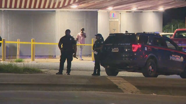 One dead, two injured in drive-by shooting at northwest Atlanta liquor store