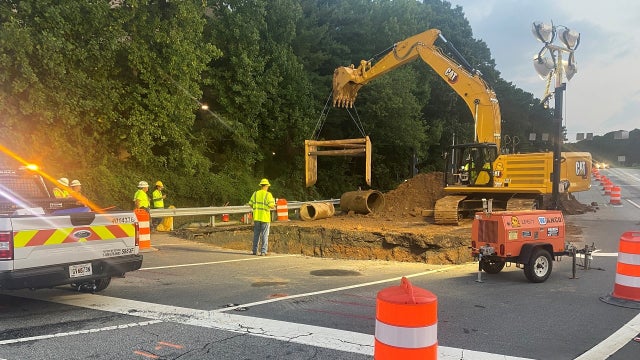 Emergency repairs after sinkhole forms along I-285 off-ramp at Cobb Parkway