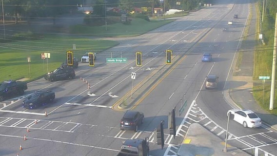 Driver arrested after injuring Duluth police officer in hit-and-run crash, officials say