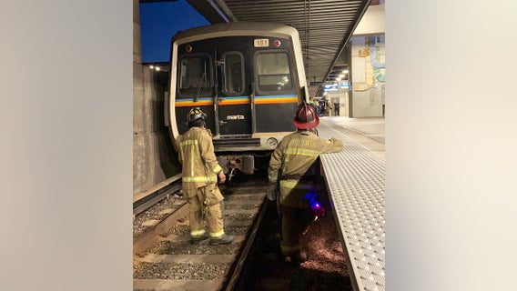 Man rescued after being trapped under catwalk at MARTA station, firefighters say