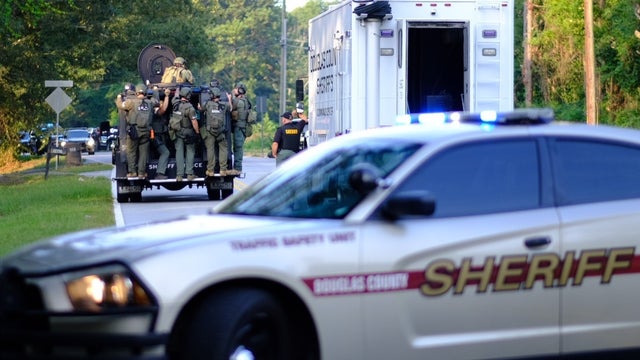 Man in custody, woman on the run after standoff at Douglas County home, deputies say