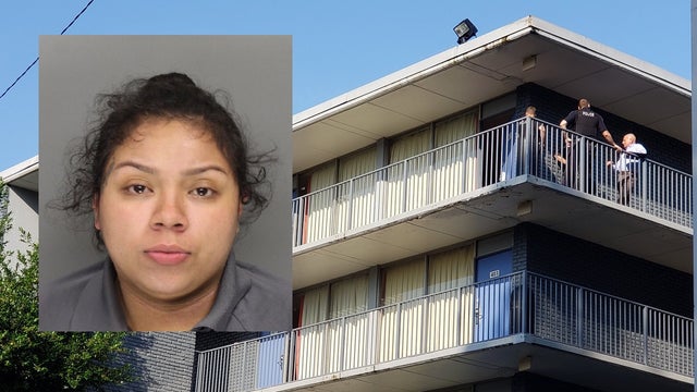 Woman charged with murder in Marietta motel shooting