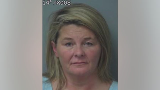 Gwinnett woman accused of intentionally injuring passenger by crashing car into tree