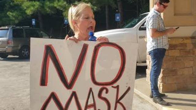 Mask fights rip Georgia schools as hospitals repeat warnings
