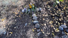 Gabby Petito's stepfather lays stone cross at spot where remains were found