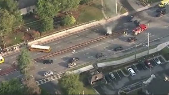 Driver injured in fiery crash involving DeKalb County school bus