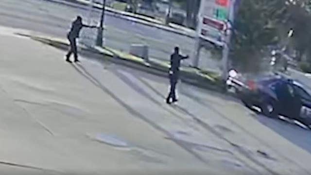 'Cops were firing like crazy': Video shows officers open fire in deadly gas station shooting