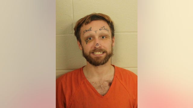 Deputies searching for tattooed man wanted for arson, child cruelty