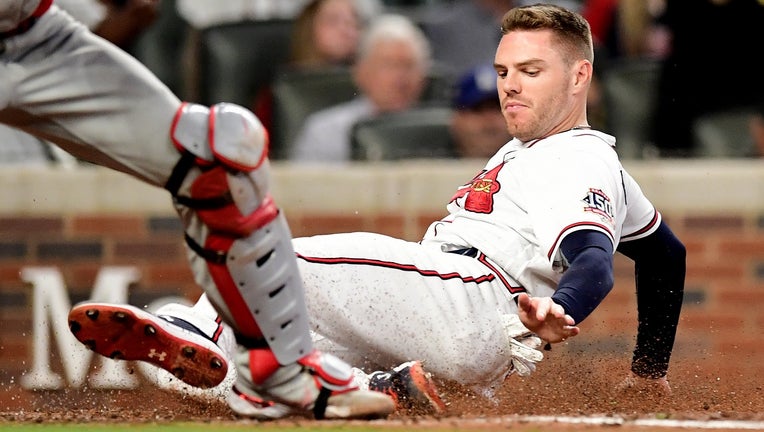 Are Braves really putting Freddie Freeman at third? Or is it a  Costanza-esque ruse?