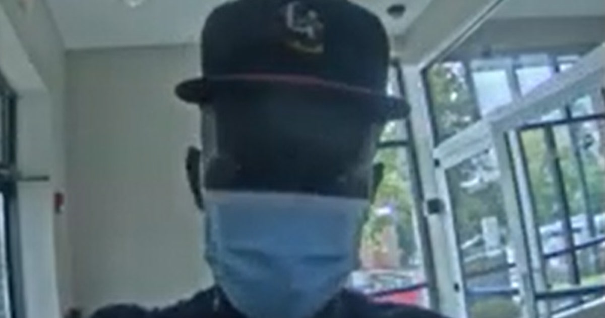 Police release video of suspect accused of kidnapping man at gunpoint ...