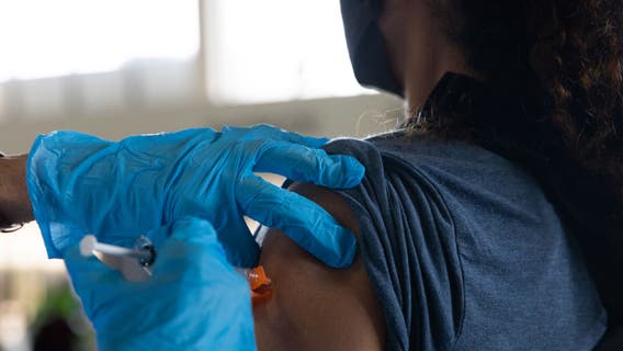 With cases rising, 4 states open COVID-19 booster shots to all adults