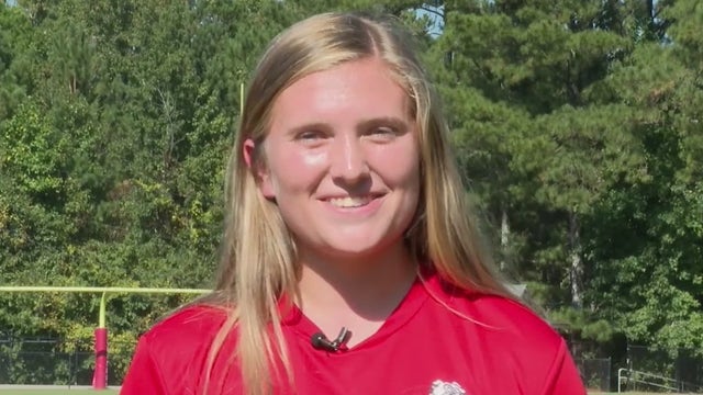 Georgia high schooler goes from gown to jersey for homecoming