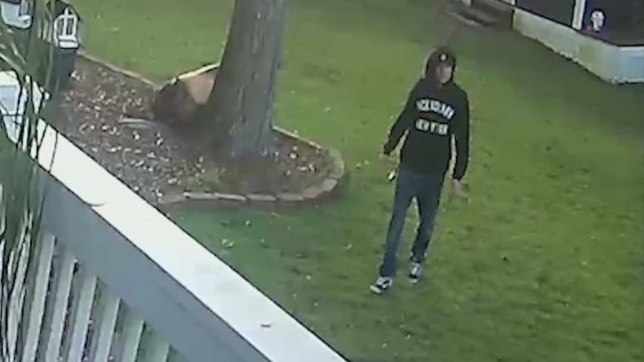 A man is caught by home surveillance walking through the backyard of a Marietta family's home.