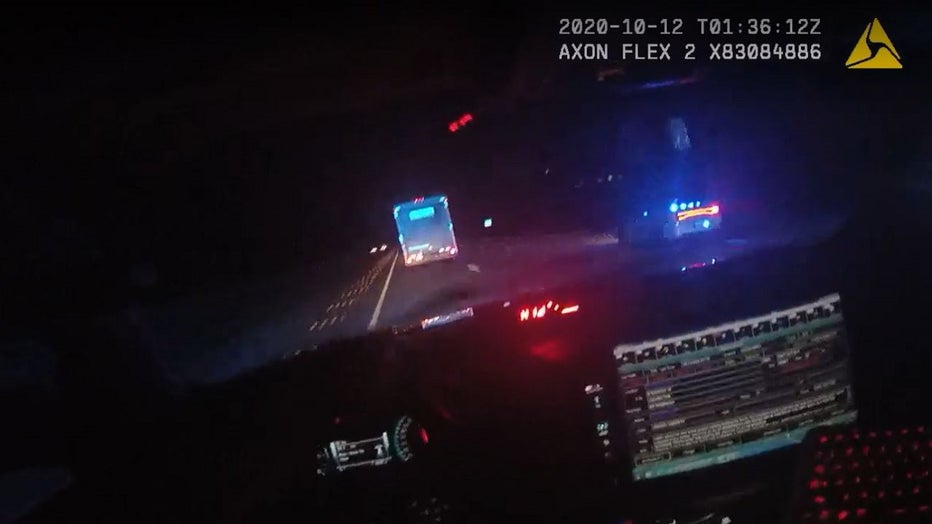 Bodycam from a Coweta County deputy shows the driver of a U-Haul swerve to avoid stop sticks during a high-speed chase along I-85 on Oct. 11, 2020.