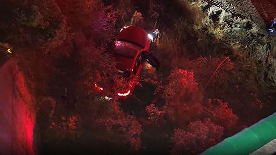 This image provided to FOX 5 shows a car that had plunged nearly 40 feet off Marietta Road.