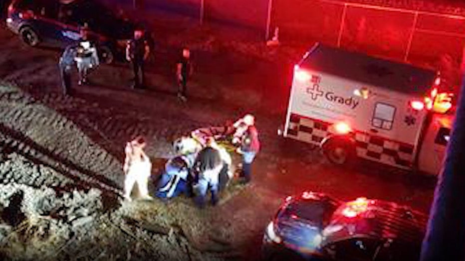 This image provided to FOX 5 shows emergency workers rescuing a driver that crashed 40 feet off Marietta Road.