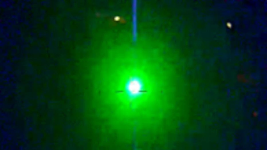 Police released this photo showing a green laser being pointed into the cockpit of the department's helicopter unit on July 1, 2021.