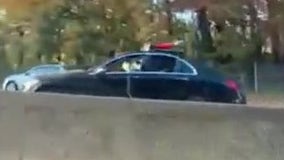 VIDEO:  Man opens fire through sunroof of moving car in Queens