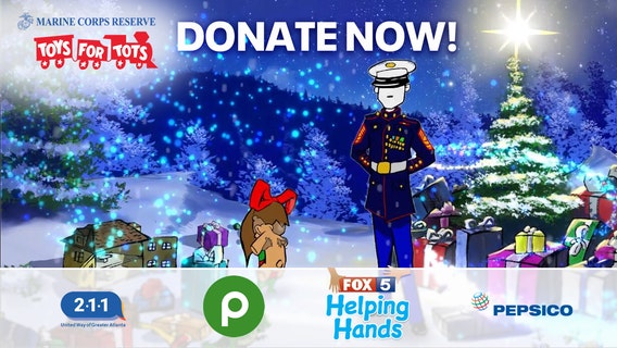 Volunteer 'elves' working hard in the Metro Atlanta Toys for Tots warehouse