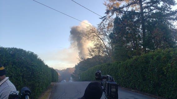 Suspect in LaGrange standoff believed to be dead after house fire and explosion, police say