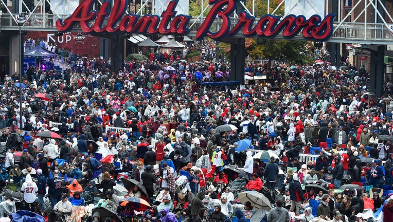Braves fans watch game outside Truist Park, team heads to NLCS