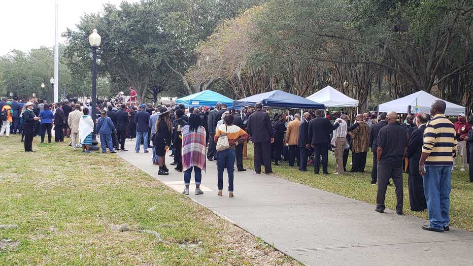 Hundreds gather outside the Glynn County courthouse in response to a defense lawyer’s bid to keep Black ministers out of the courtroom on Nov. 18, 2021.