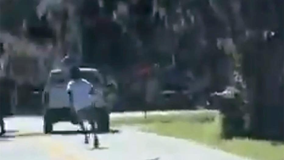 Still from a video showing Ahmaud Arbery jogging through a Brunswick neighborhood moments before he was shot and killed on Feb. 23, 2020.