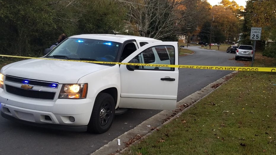Police investigate a deadly shooting near the area of Buckhurst Trail and Cedar Hurst Trail in South Fulton on the afternoon of Nov. 13, 2021.