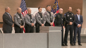 Three wounded officers and the men who rescued them honored by governor