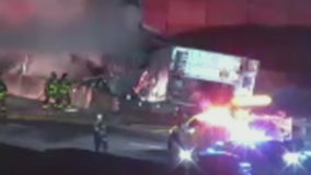 Tractor trailer catches fire near I-75 and I-285 in Cobb County