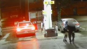 Surveillance footage shows man assaulted at gunpoint while pumping gas