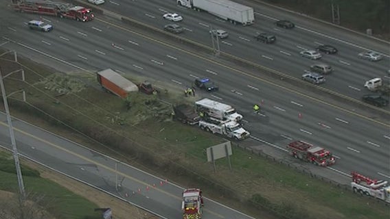Vehicle fire blocks multiple lanes on I-285 in Dunwoody