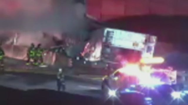 Tractor trailer catches fire near I-75 and I-285 in Cobb County