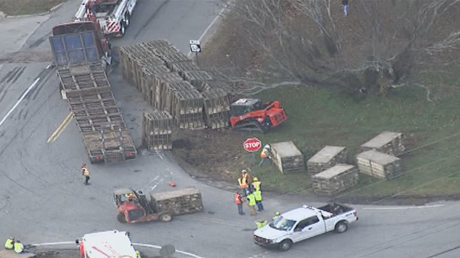 A truck carrying chickens overturns along Highway 52 and Old Cornelia Highway causing a mess on Dec. 27, 2021.
