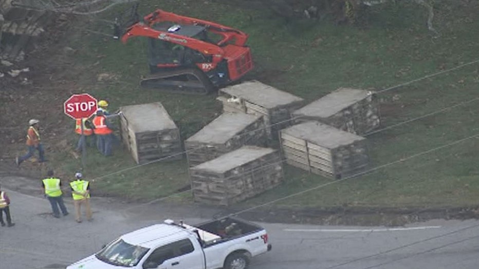 A truck carrying chickens overturns along Highway 52 and Old Cornelia Highway causing a mess on Dec. 27, 2021.