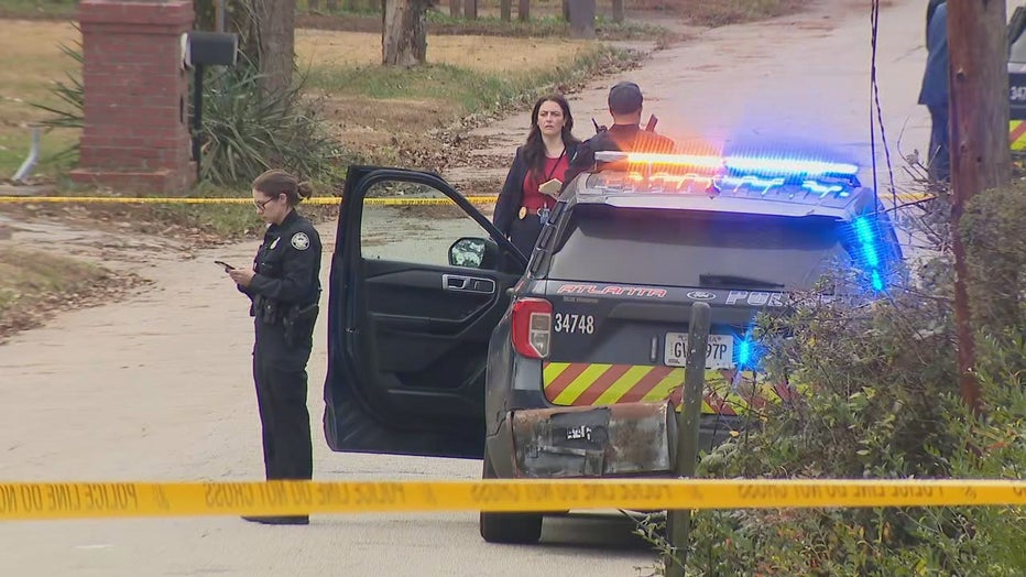 Police investigate a shooting death on Thaxton Drive SE on Dec. 15, 2021.