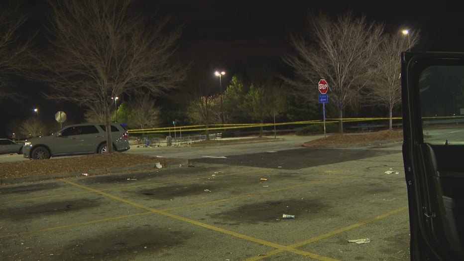 Police investigate a reported shootout in the Walmart parking lot in South Fulton on Dec. 15, 2021.