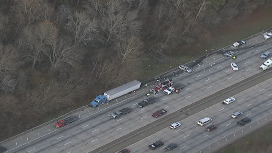 Troopers investigate a deadly crash along I-85 at GA-74 in Fairburn on Dec. 9, 2021.