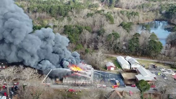 Fire under investigation after Fayette County consignment store goes up in flames