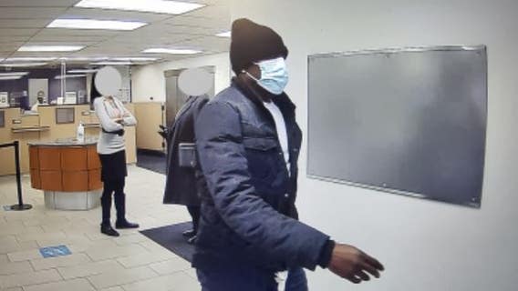 Masked man robs Forest Park bank, police search for suspect