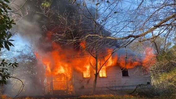 Firefighters battle blaze at abandoned home in Duluth