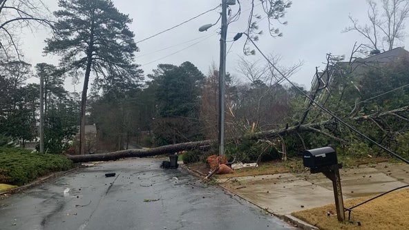 Winter snow storm power outages: Georgia powerlines down, roads become slick as snowfall continues