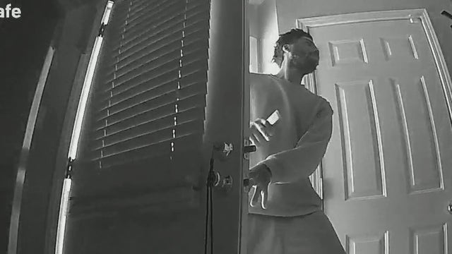 Burglar caught on camera breaking into home as women slept inside