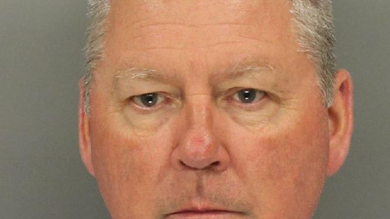 Georgia sheriff wanted for sexual battery turns himself in, jail