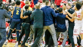 Michigan coach Howard hits Wisconsin assistant after a loss