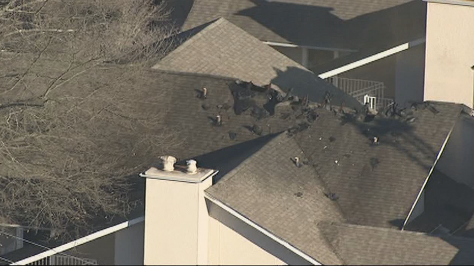 Flames cause damage to the roof of a Smyrna hotel on Feb. 8, 2022.