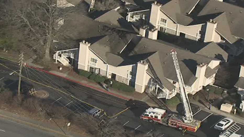 Firefighter say flames were shooting through the roof of a hotel on Cumberland Blvd. on Feb. 8, 2022.