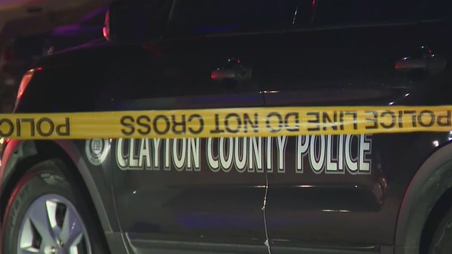 Police investigate a deadly shooting at a Riverdale apartment on Feb. 14, 2022.