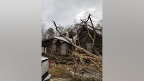 First responders rescue two people trapped after tree falls on Cherokee County home